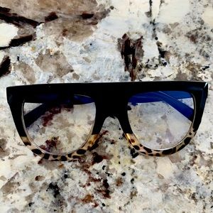 Celine-esque design glasses. Half animal and black